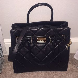 Chic Michael Kors Black quilted leather handbag!